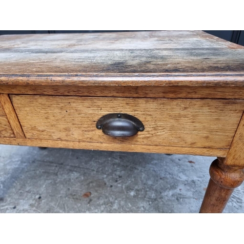 1051 - A late Victorian pale oak desk, 107cm wide. 