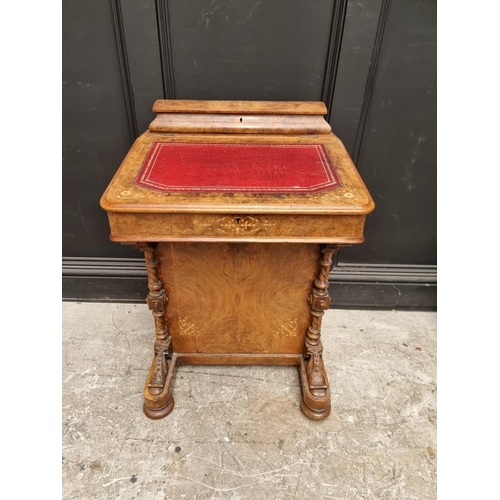 1064 - A Victorian walnut and inlaid Davenport, 54.5cm wide. 