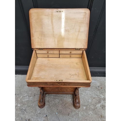 1064 - A Victorian walnut and inlaid Davenport, 54.5cm wide. 