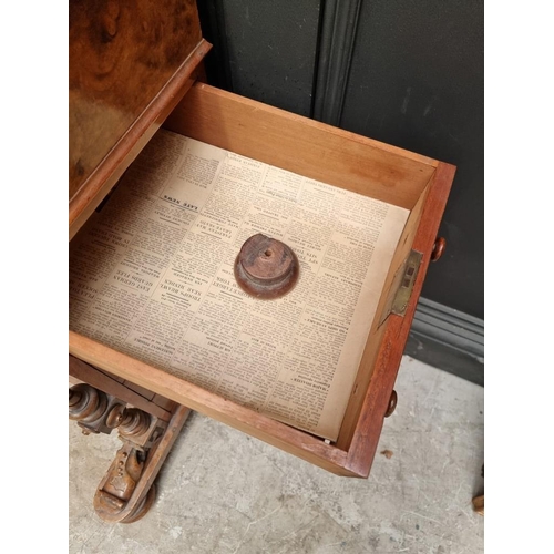 1064 - A Victorian walnut and inlaid Davenport, 54.5cm wide. 