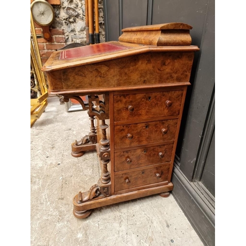 1064 - A Victorian walnut and inlaid Davenport, 54.5cm wide. 