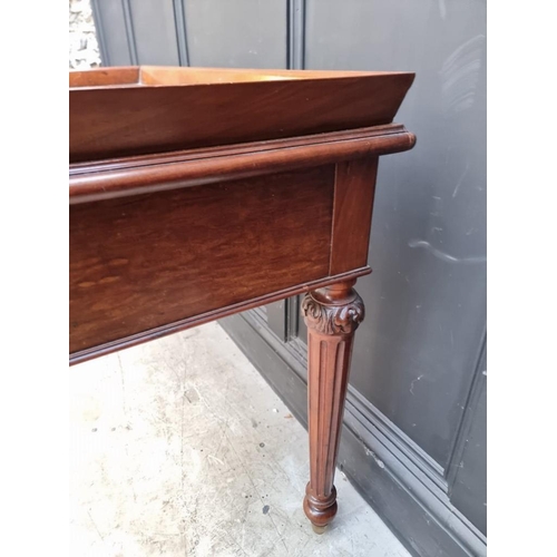 1065 - A Victorian carved mahogany desk, 108cm wide. 