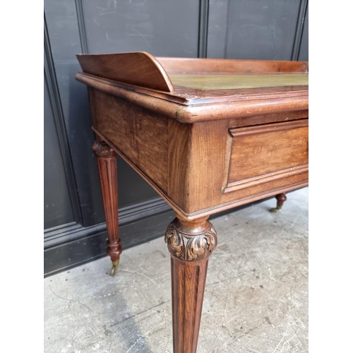 1065 - A Victorian carved mahogany desk, 108cm wide. 