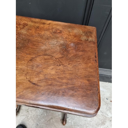 1066 - A Victorian figured walnut and inlaid combined games and work table, 55.5cm wide, (lacking bag).... 