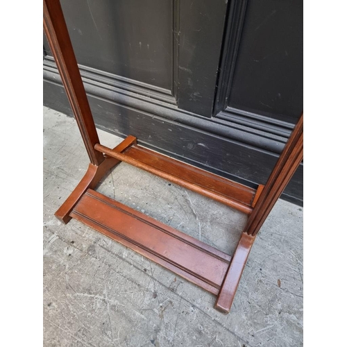 1075 - A reproduction mahogany valet stand. 