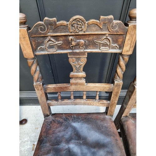 1079 - An unusual pair of Victorian carved oak side chairs, the backs carved with a horse, stirrups and oth... 