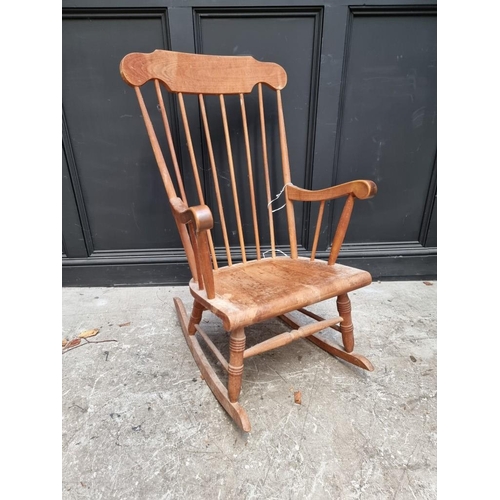 1081 - An old beech rocking chair. 