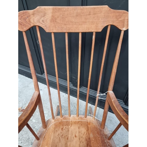 1081 - An old beech rocking chair. 