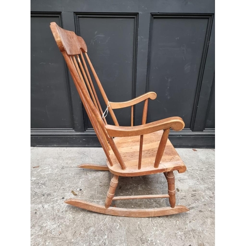 1081 - An old beech rocking chair. 