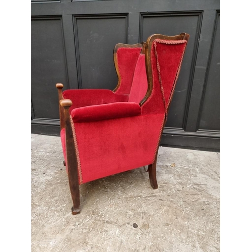 1091 - A circa 1900 mahogany and inlaid wing armchair.  