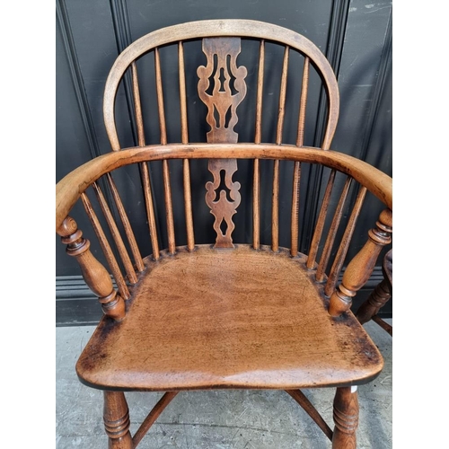 1097 - Two similar Victorian ash and elm stick back Windsor armchairs, each with crinoline stretcher.... 