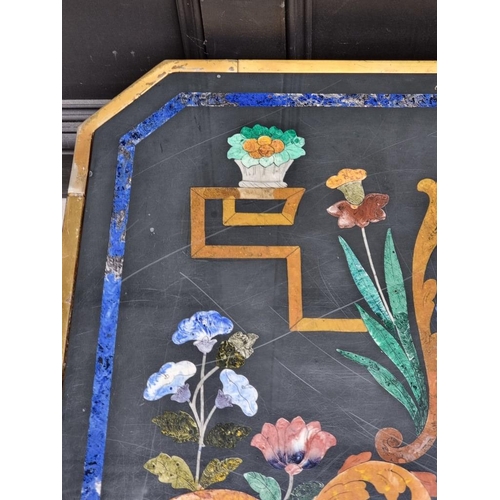 1103 - A large slate and pietra dura table top, 105cm wide, on lacquered brass low stand, (shallow chi... 