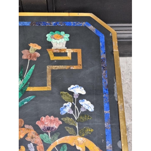 1103 - A large slate and pietra dura table top, 105cm wide, on lacquered brass low stand, (shallow chi... 