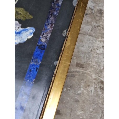 1103 - A large slate and pietra dura table top, 105cm wide, on lacquered brass low stand, (shallow chi... 