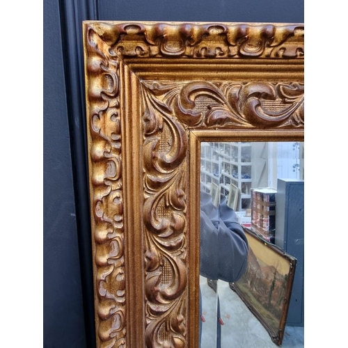 1106 - A large gilt framed rectangular wall mirror, 171 x 109.5cm.