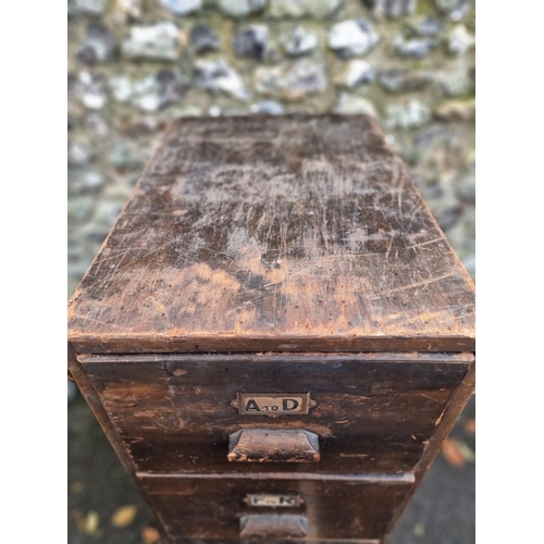 1110 - A vintage stained pine filing cabinet, 45cm wide. 