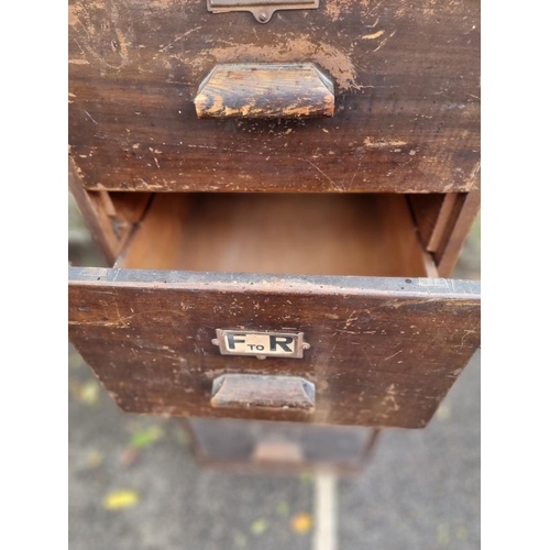 1110 - A vintage stained pine filing cabinet, 45cm wide. 