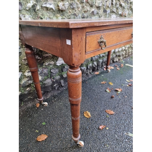 1111 - A late Victorian mahogany two drawer side table, 122cm wide.  