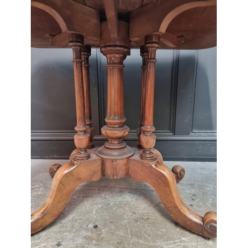 1112 - An unusual Victorian burr walnut Sutherland table, with gateleg action, 106.5cm when open. ... 