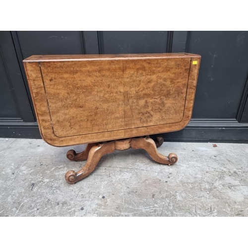 1112 - An unusual Victorian burr walnut Sutherland table, with gateleg action, 106.5cm when open. ... 