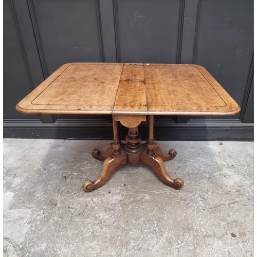 1112 - An unusual Victorian burr walnut Sutherland table, with gateleg action, 106.5cm when open. ... 