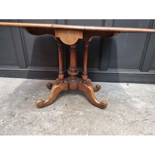 1112 - An unusual Victorian burr walnut Sutherland table, with gateleg action, 106.5cm when open. ... 