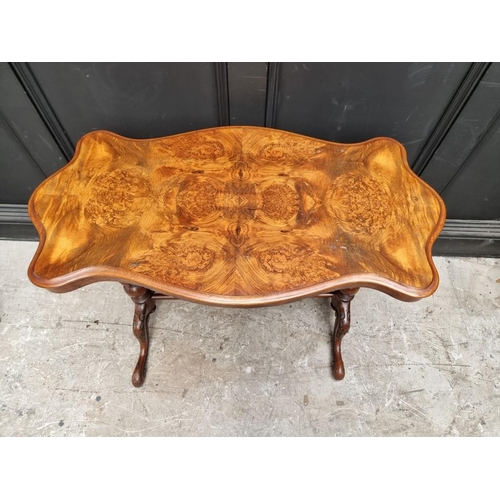 1125 - A Victorian burr walnut occasional table, with quarter veneered and shaped top, 90.5cm wide.... 