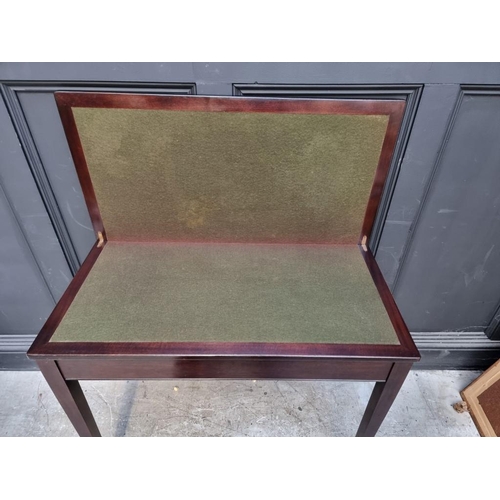 1060 - A mahogany rectangular card table, 91.5cm wide. 