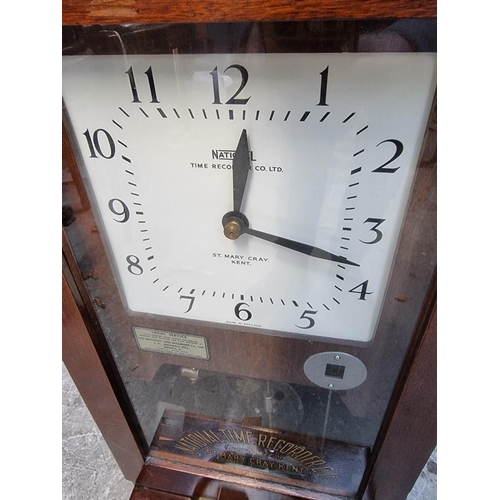 1128 - A vintage mahogany 'Clocking-In' clock, by National Time Recorder Co Ltd, 98.5cm x 36cm.... 