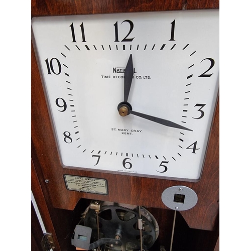 1128 - A vintage mahogany 'Clocking-In' clock, by National Time Recorder Co Ltd, 98.5cm x 36cm.... 