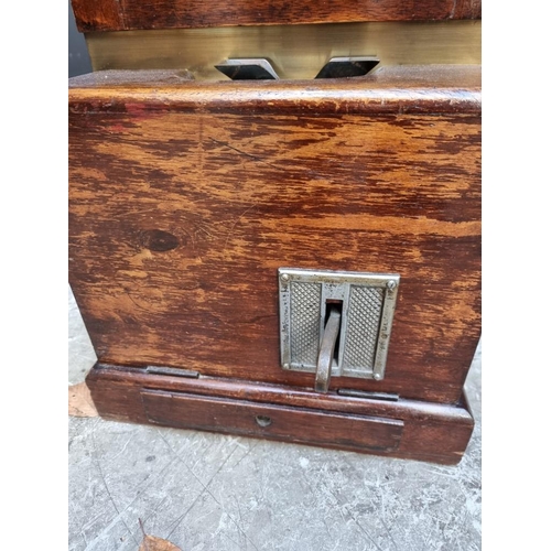 1128 - A vintage mahogany 'Clocking-In' clock, by National Time Recorder Co Ltd, 98.5cm x 36cm.... 