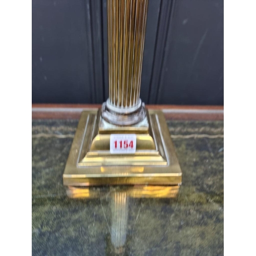 1154 - A brass Corinthian column table lamp, total height 43cm high. 