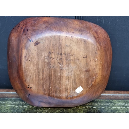 1160 - Two New Zealand kauri wood bowls, each inscribed to base, largest 41cm wide.