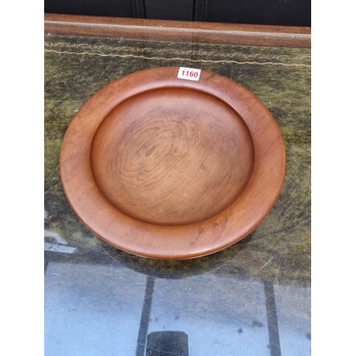 1160 - Two New Zealand kauri wood bowls, each inscribed to base, largest 41cm wide.