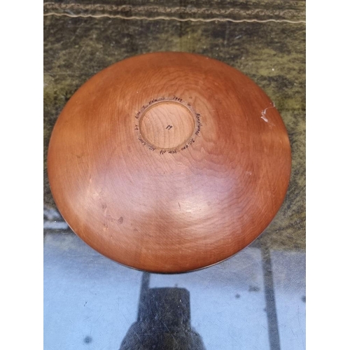 1160 - Two New Zealand kauri wood bowls, each inscribed to base, largest 41cm wide.