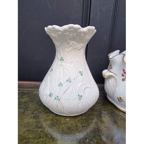 1161 - A Belleek 'Daisy' vase, 23cm high; together with Ginori porcelain twin handled cachepot, 16.5cm high... 