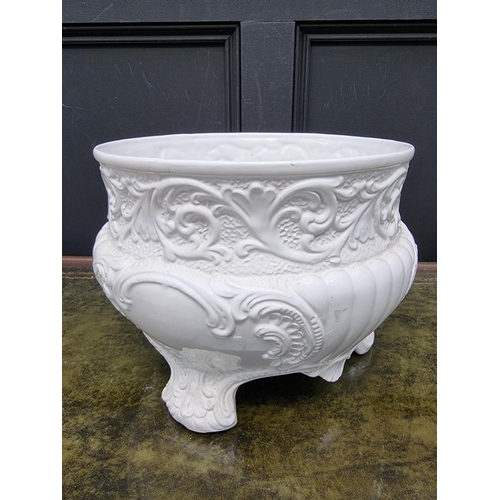 1168 - A large white glazed pottery tripod jardiniere, 33.5cm diameter.