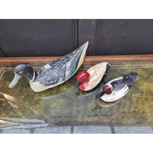 1178 - Three painted wood decoy ducks, largest 44cm long. 