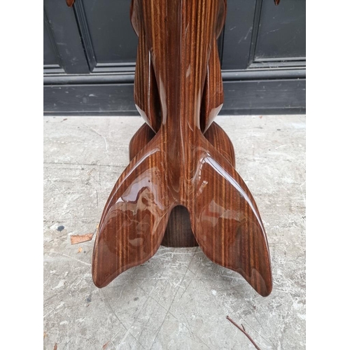 1195 - A large and impressive limited edition carved plywood dolphin sculpture, by Chris Wallis, signed and... 