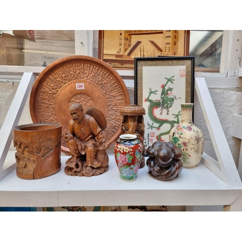 1201 - A mixed group of Oriental and Eastern items. (8)