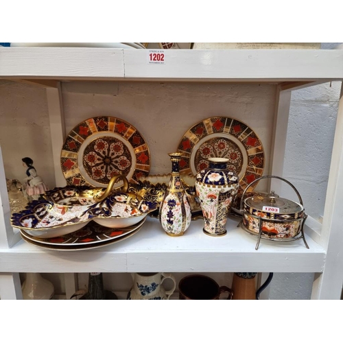 1203 - A collection of Royal Crown Derby and other similar Imari. (12)