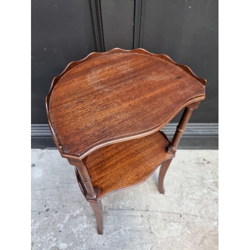 1017 - A small reproduction mahogany two tier occasional table, 34.5cm wide; together with a nest of three ... 