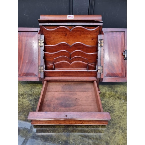 1055 - A Victorian mahogany stationary casket, 31cm wide. 