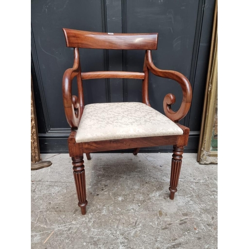 1083 - A William IV mahogany elbow dining chair.  