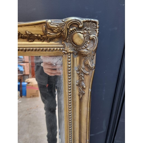 1107 - A reproduction gilt framed rectangular wall mirror, 108 x 75.5cm.