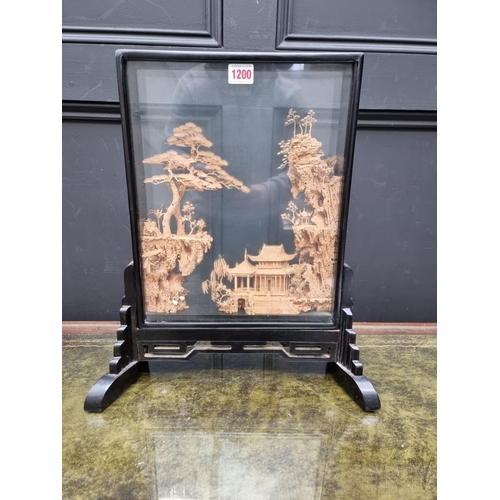 1200 - A large Chinese carved cork diorama, in black lacquer case, 46.5 x 40.5cm.... 