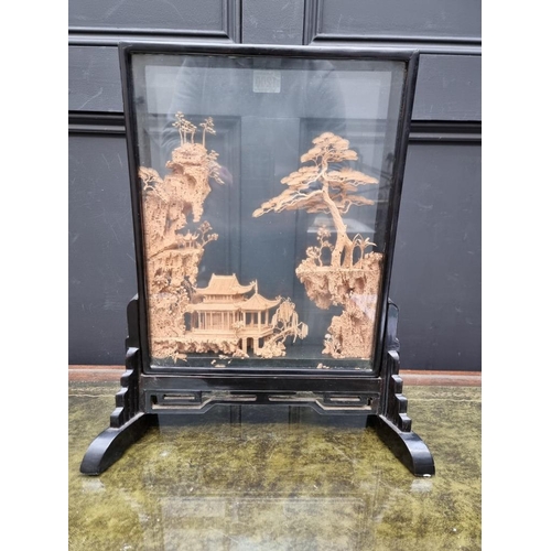 1200 - A large Chinese carved cork diorama, in black lacquer case, 46.5 x 40.5cm.... 