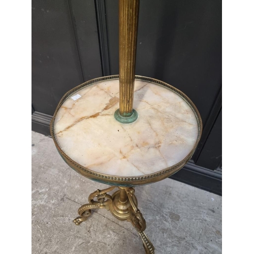 1229 - A brass and onyx tripod stand, 124cm high. 