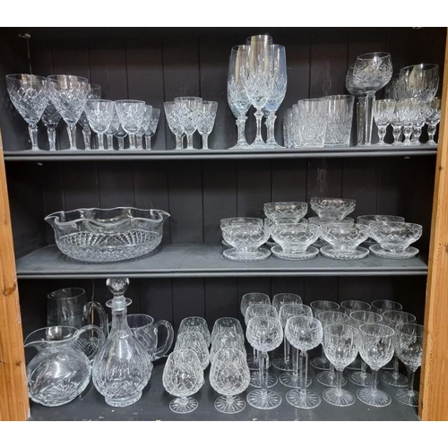 1374 - A collection of drinking glasses, comprising part sets. (three shelves)