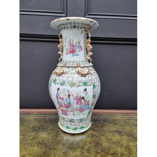 1425 - A large Chinese famille rose twin handled vase, 19th century, 44.5cm high, (riveted). ... 